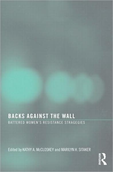 BACKS AGAINST THE WALL